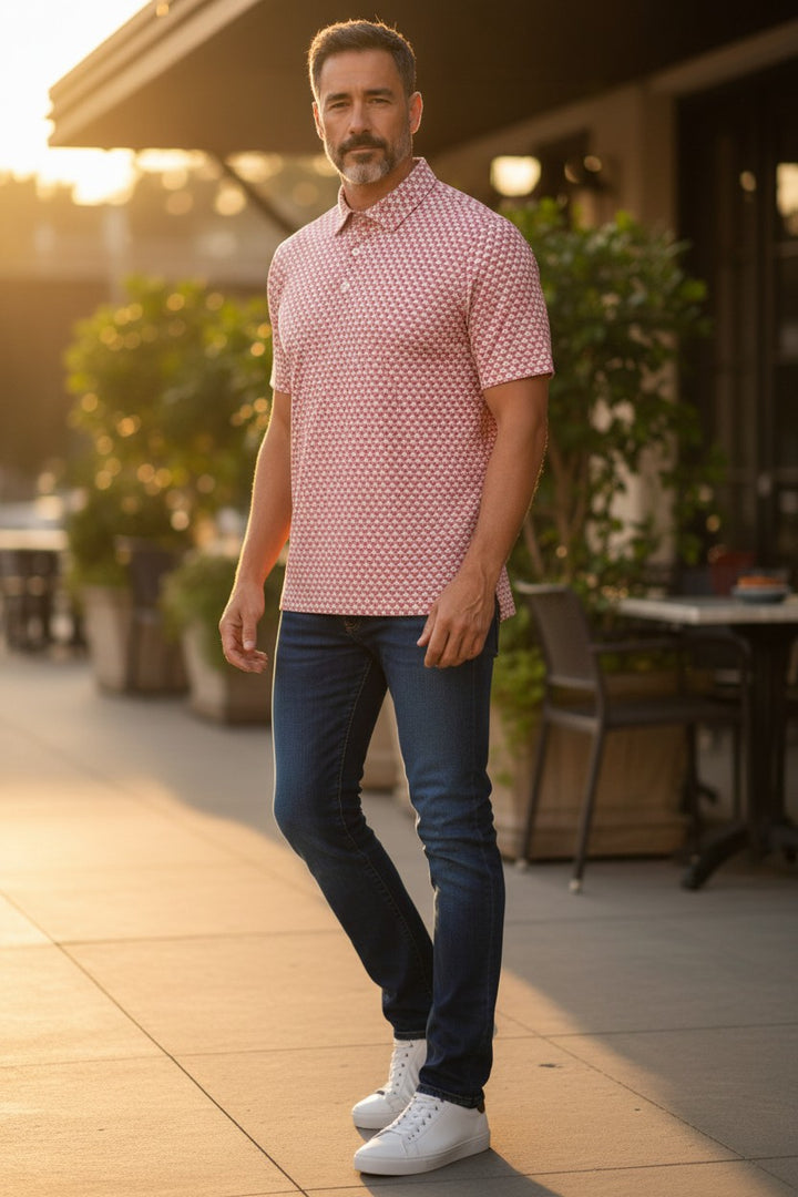 LA VITA GOLF Performance Polo shirt in orange crush with a geometric triangle pattern. Lightweight, breathable, and moisture-wicking polyester-spandex blend.